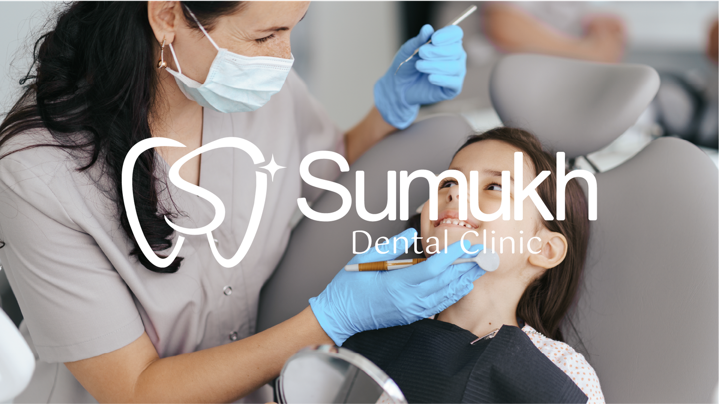 Sumukh dental clinic logo featuring a minimal white tooth symbol and modern typography displayed over a dental care photograph.